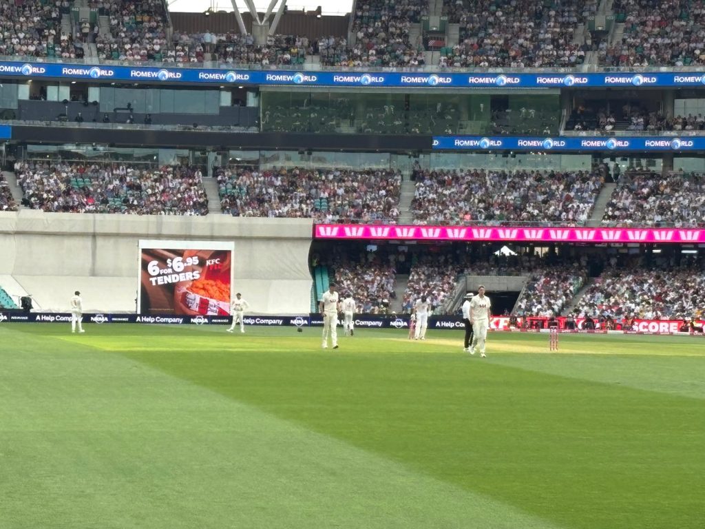 England fielders walk back to their positions as play resumes at the Sydney Cricket Ground during the fifth Ashes Test.