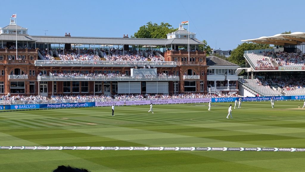 Close-up of the Indian and England flag waving above the pavilion roof at Lord's